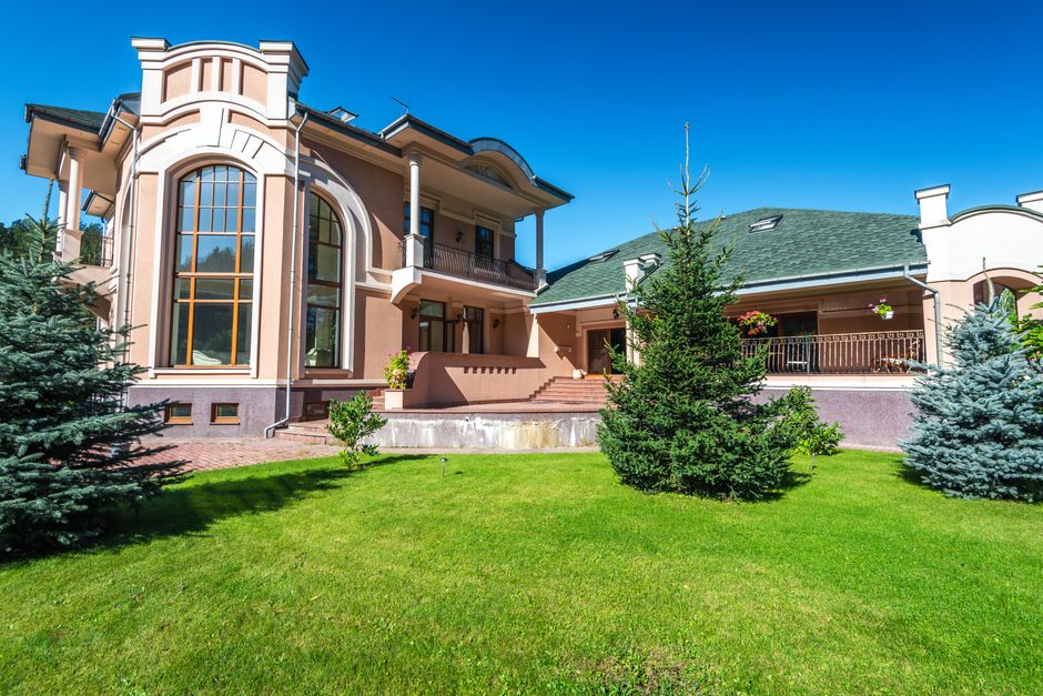 Modern home exterior showcasing new vinyl siding and superior insulation